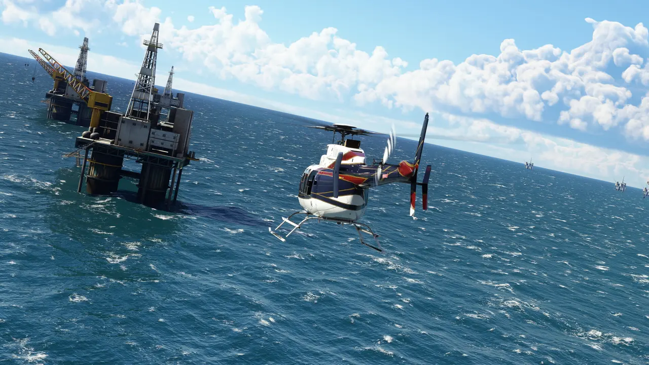 A red and white helicopter flying low over the sea toward an oil platform
