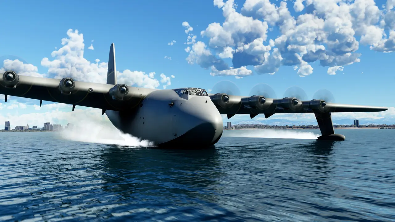 The Hughes H-4 Hercules "Spruce Goose" flying boat taking off from the water, its eight engines running