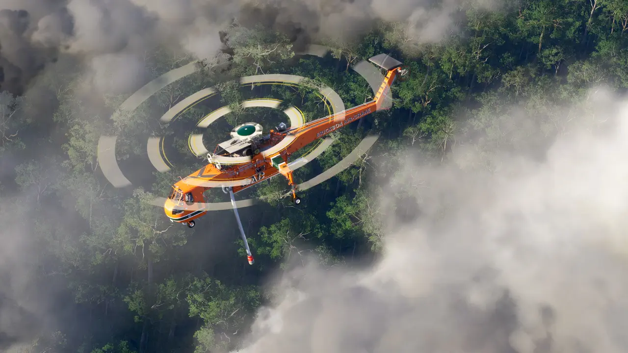 MSFS 2024: an orange heavy-lift firefighting helicopter flying over a forest through wildfire smoke, seen from above