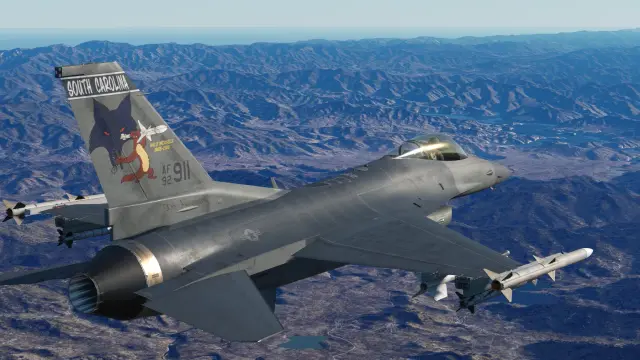An F-16 flying over mountains in Falcon BMS 4.38